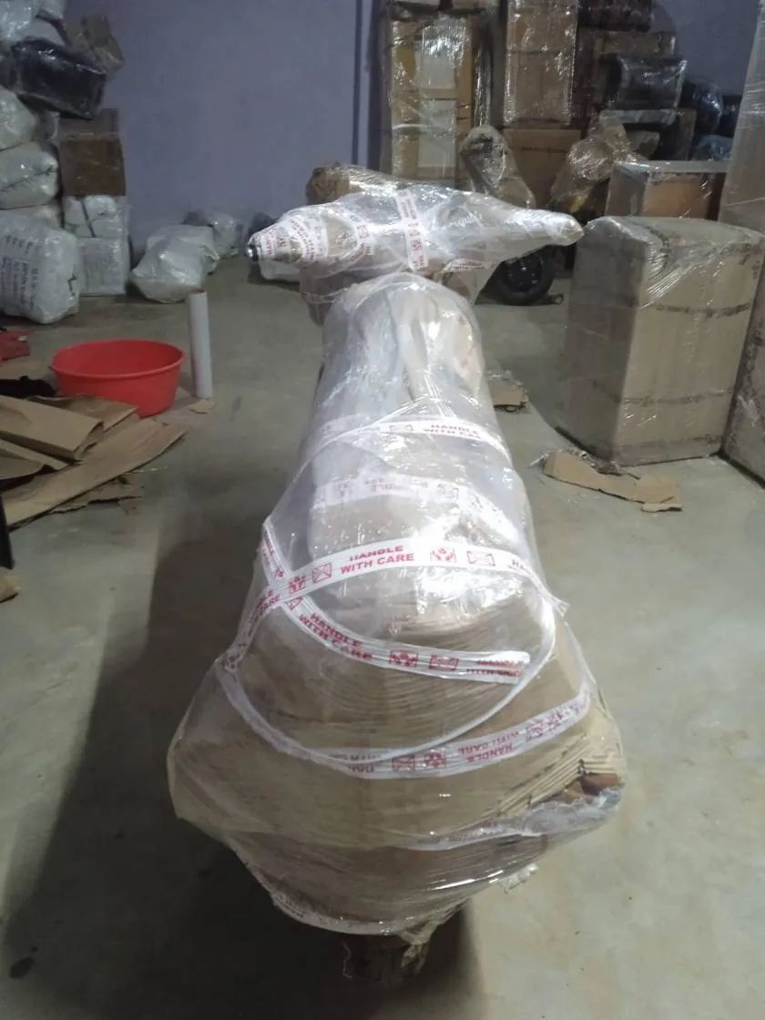 Real multi-layer foam and bubble wrap packing of two-wheeler for Bangalore to Hyderabad bike transport
